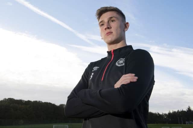 Hearts defender Jimmy Dunne had posters of Steven Gerrard on his bedroom wall as a youngster. Picture: SNS.