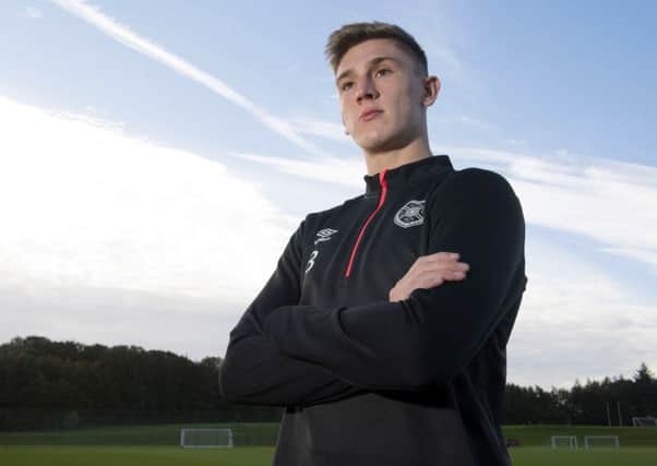 Hearts defender Jimmy Dunne had posters of Steven Gerrard on his bedroom wall as a youngster. Picture: SNS.