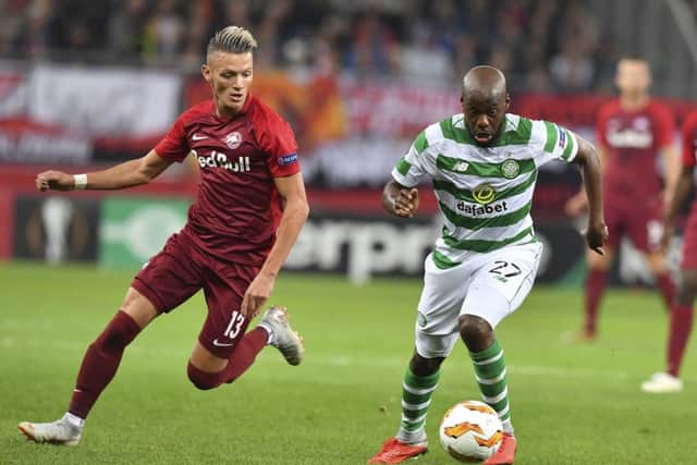 Youssouf Mulumbu breaks clear of Salzburgs Hannes Wolf during Celtics Europa League defeat in Austria on Thursday night. Picture: AP