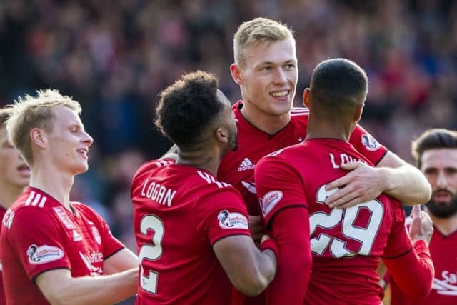 Aberdeen's Sam Cosgrove celebrates his second goal. Pic: SNS/Alan Harvey