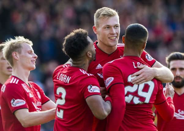 Aberdeen's Sam Cosgrove celebrates his second goal. Pic: SNS/Alan Harvey