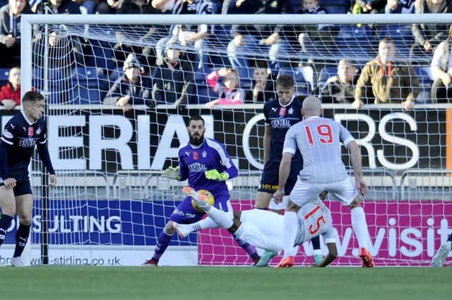 Myles Hippolyte shot saved on to the bar by Leo Fasan. Pic: Michael Gillen