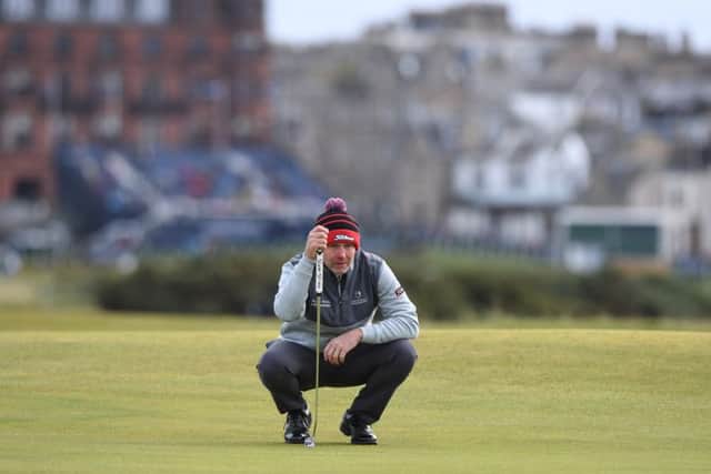 Stephen Gallacher lines up a putt during his final round. Picture: SNS