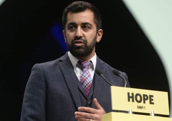 Justice Secretary Humza Yousaf MSP addressees delegates at the first day of the 3-day SNP Autumn Conference in Glasgow SEC.  Picture: SWNS