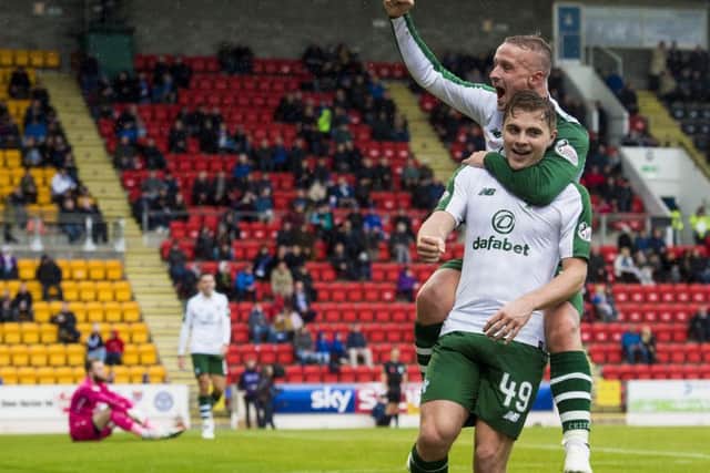Leigh Griffiths celebrates with four-goal hero James Forrest. Picture: SNS Group