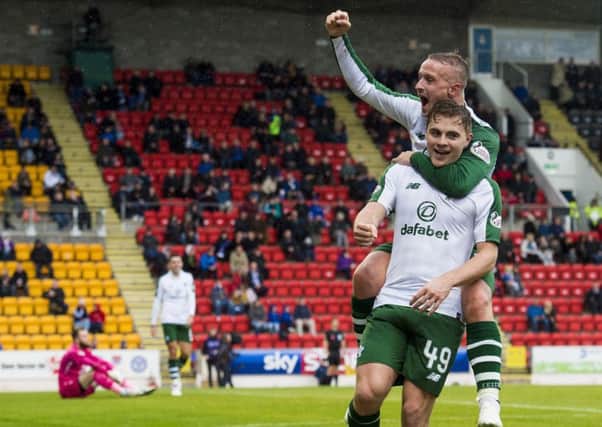 Leigh Griffiths celebrates with four-goal hero James Forrest. Picture: SNS Group