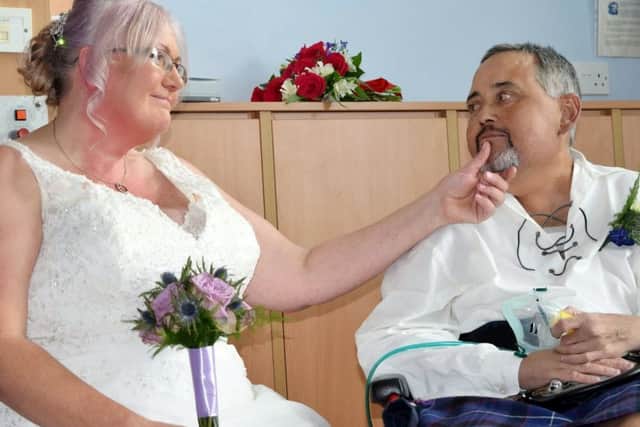 Robert Couttie, 50, and his partner Debbie Coulson. Picture: SWNS
