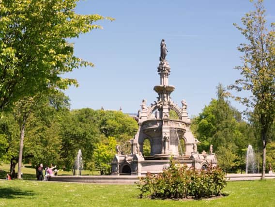 Families with children enjoying sunny weather near the Stewart memorial fountain in the Kelvingrove Park of Glasgow, Scotland, UK. Pic: Shutterstock - vetasster