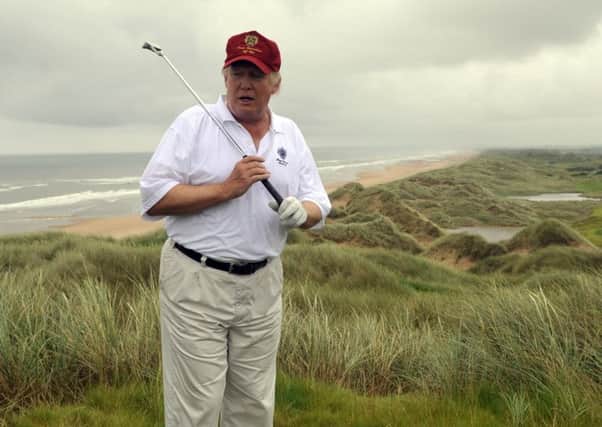 Donald Trump plays Trump International Golf Links in Balmedie, Aberdeenshire  (Picture: Phil Wilkinson)