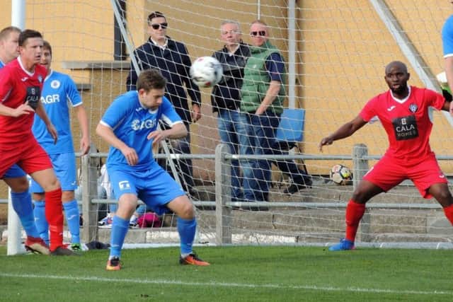 Penicuik on the attack in red Lambert Kateleza and Wayne McIntosh. (picture: Jim Dick)