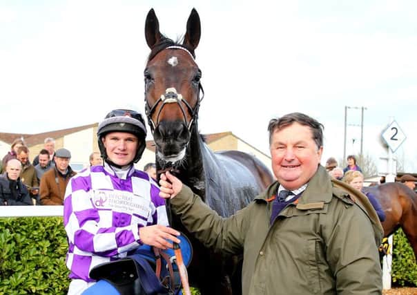 Sam Morshead with son Henry and his winning horse Orbasa (Photo by PPAUK/REX/Shutterstock)