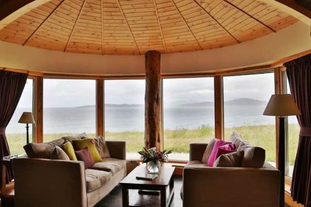 The panoramic window in the living room gives you unparalleled views of the Atlantic, Taransay and the Harris peaks. Picture: Contributed