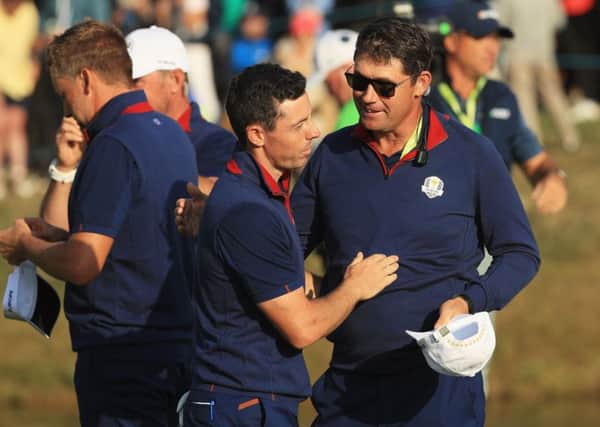 Europe's Rory McIlroy with vice-captain Padraig Harrington at last month's Ryder Cup at Le Golf National near Paris. Picture: Mike Ehrmann/Getty Images