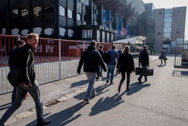 Investigators at Club Brugge's stadium as searches were carried out across Europe as part of a larger investigation into tax evasion, money laundering and possible match fixing. Picture: Getty Images