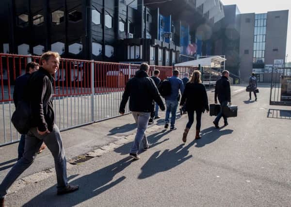Investigators at Club Brugge's stadium as searches were carried out across Europe as part of a larger investigation into tax evasion, money laundering and possible match fixing. Picture: Getty Images