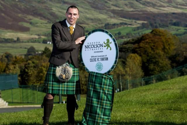 Scott Brown launches Celtic's new tartan to celebrate the club's 130th anniversary at Lennoxtown. Picture: SNS