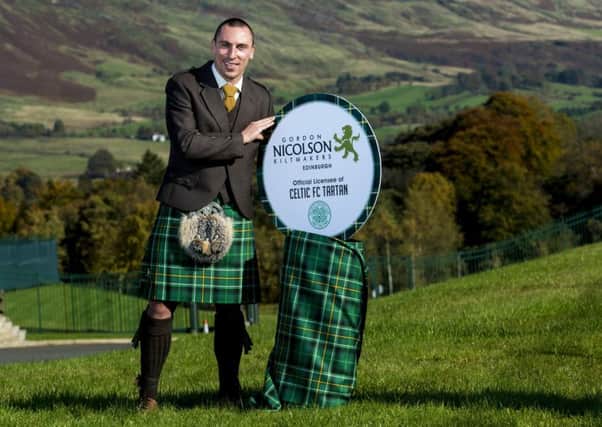 Scott Brown launches Celtic's new tartan to celebrate the club's 130th anniversary at Lennoxtown. Picture: SNS