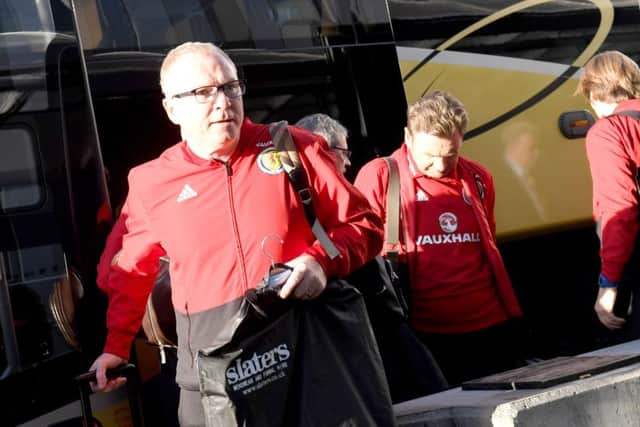 Scotland manager Alex McLeish gets ready for flight to Tel Aviv. Picture: Gary Hutchison/SNS