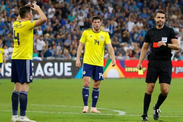 Scotland defender John Souttar reacts after being sent off during the Nations League defeat by Israel. Picture: Jack Guez/AFP/Getty Images