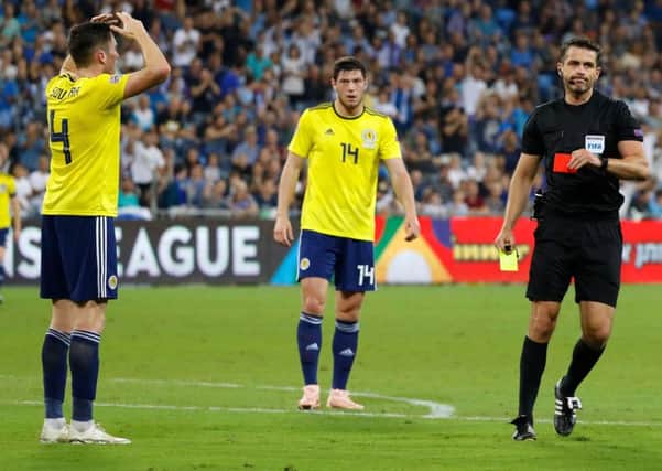 Scotland defender John Souttar reacts after being sent off during the Nations League defeat by Israel. Picture: Jack Guez/AFP/Getty Images