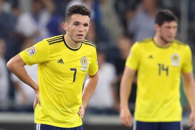 John McGinn is a picture of dejection after Scotland concede the second goal at the Sammy Ofer Stadium. Picture: PA