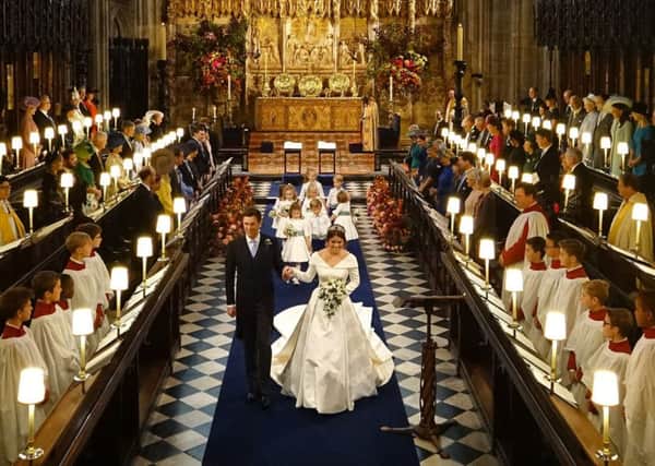 Princess Eugenie walks back down the aisle with husband Jack Brooksbank. Picture: Jonathan Brady - WPA Pool/Getty Images
