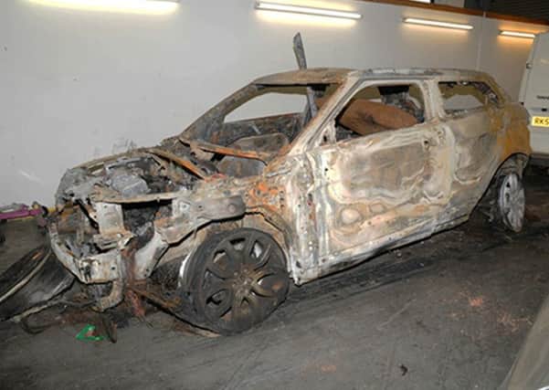 A stolen Range Rover used in the 'terrifying' Â£500,000 armed robbery at the Gleneagles Hotel was later found burned out (Picture: Crown Office/PA)