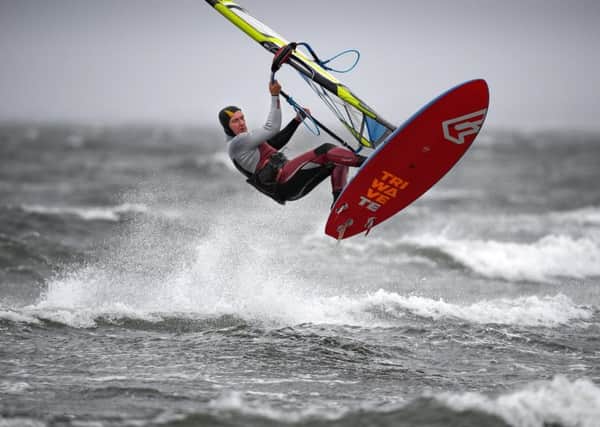 Windsurfers make the most of the stormy condition sat Barassie Beach at Troon in South Ayrshire. Picture: Getty