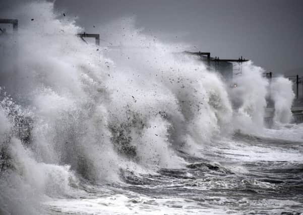 Waves crash against the sea wall as Storm Callum hits the seafront on October 12, 2018 in Saltcoats. (Photo by Jeff J Mitchell/Getty Images)