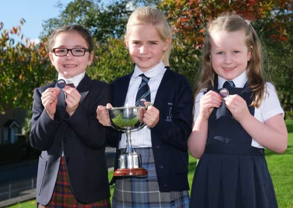 (L-R)  Niamh McCrudden (Silver), Millie Kathryn Bonniwell (Gold) and Esme McLeod (Bronze) after competing in the Gaelic poetry recital competition for 7-8 year old learners at this years Royal National MÃ²d in Dunoon.