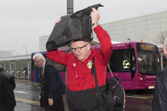 Scotland manager Alex McLeish came home to a wet Glasgow following the defeat in Israel. Picture: Craig Foy/SNS