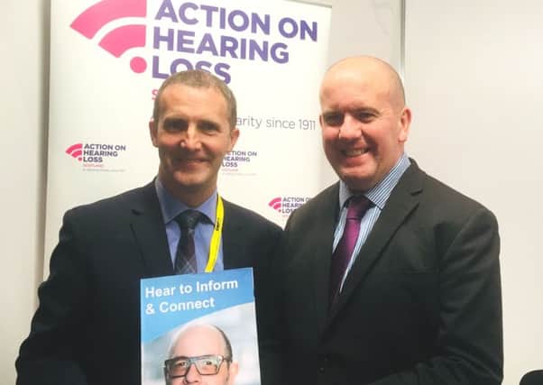 Falkirk West MP Michael Matheson, left, with Alan Dalziel of Action on Hearing Loss Scotland.