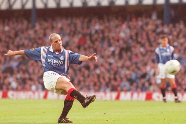 19/10/96 BELL'S PREMIER DIVISION
RANGERS V ABERDEEN (2-2)
IBROX - GLASGOW
Paul Gascoigne curls a free kick into the Aberdeen net to Rangers ahead.