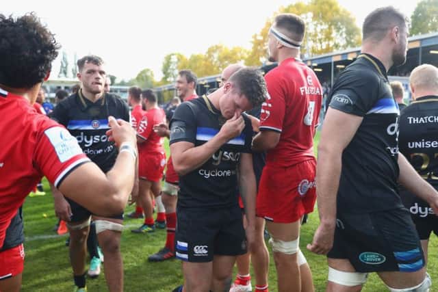 Freddie Burns, centre, of Bath cuts a dejected figure at the final whistle. Picture: Michael Steele/Getty Images
