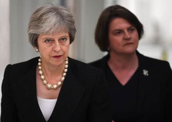 Theresa May and Arlene Foster, leader of the DUP, on a visit to Northern Ireland. Picture: AFP/Getty Images