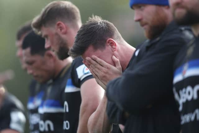 Bath's Freddie Burns holds his face at the end of the European Champions Cup match at the Recreation Ground, Bath. Picture: PA
