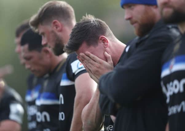 Bath's Freddie Burns holds his face at the end of the European Champions Cup match at the Recreation Ground, Bath. Picture: PA