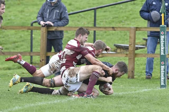 Currie Chieftains Scott McGinley powers over for a second half try despite some close attention. Photograph: Neil Hanna    Picture: Neil Hanna