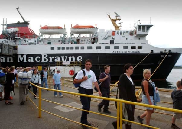 Passengers disembark from Caledonian MacBrayne's Isle of Mull ferry in Oban. Picture: Donald Macleod