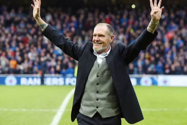 Paul Gascoigne greets Rangers fans after making a half time appearance at a game last season. Picture: SNS Group