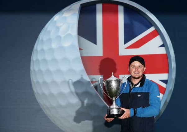 Eddie Pepperell with the British Masters trophy.