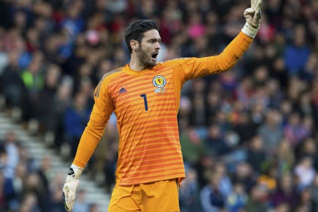 Scotland keeper Craig Gordon sets up a wall against Portugal. Picture: Alan Harvey/SNS