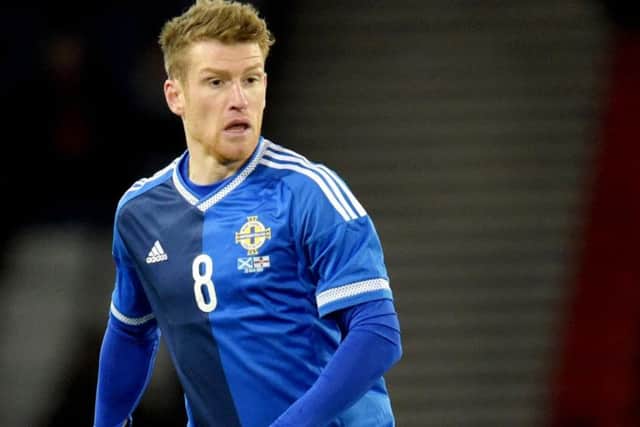 Steven Davis in action for Northern Ireland against Scotland at Hampden. The midfielder has been linked with a return to Rangers. Picture: SNS Group