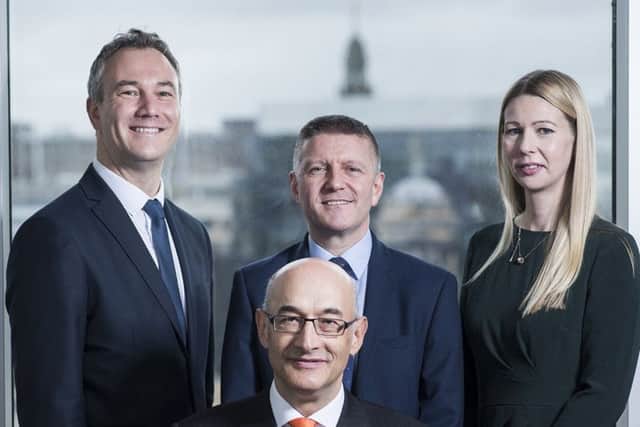 Top left to right: John Paul Sheridan, Andrew McCowan and Donna Strong with Howard Beach, pictured front. Picture: Contributed