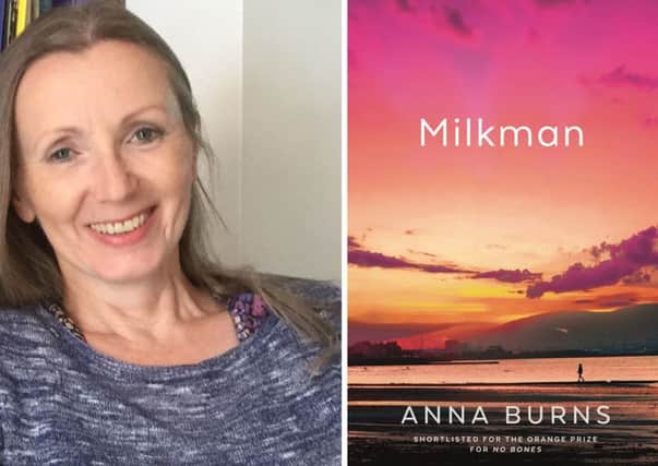Anna Burns with the cover of her novel Milkman. Picture: Man Booker Prize/PA Wire
