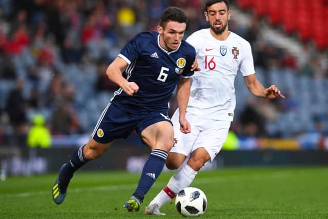 Scotland's John McGinn is confident the tide will turn for Alex McLeish's men following a difficult week. Pic: Craig Foy/SNS