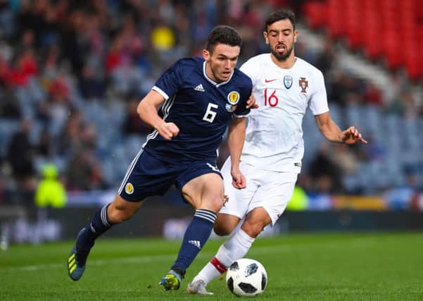 Scotland's John McGinn is confident the tide will turn for Alex McLeish's men following a difficult week. Pic: Craig Foy/SNS