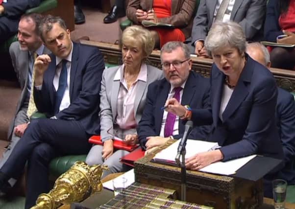 A video grab from footage broadcast by the UK Parliament's Parliamentary Recording Unit shows Prime Minister Theresa May answering a question during the weekly question and answer session. Picture; Getty