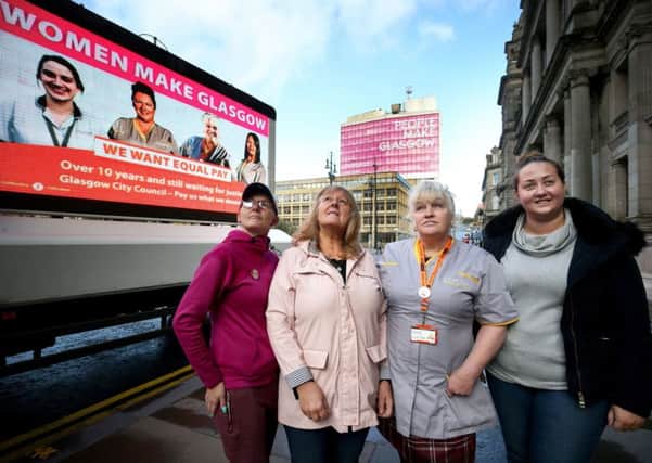 A plea for solidarity in the shape of an advertising campaign launched by Glasgow City Council workers, left to right, Gillian Docherty, Eileen Dougall, Shona Thomson and Lee-Ann Dougall. Picture: Jane Barlow/PA.