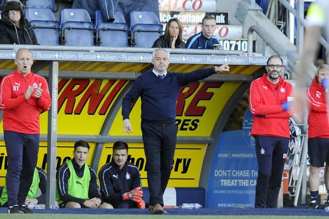 McKinnon in the dugout against Dunfermline